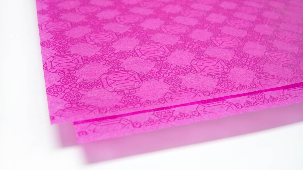 Pink pattern close up of Jewel House shop brand packaging
