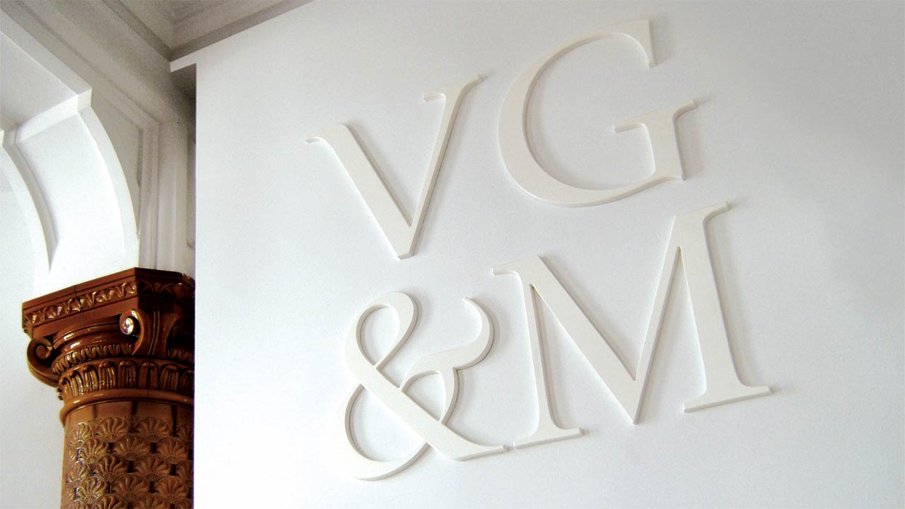 VG&M logo signage in place on wall