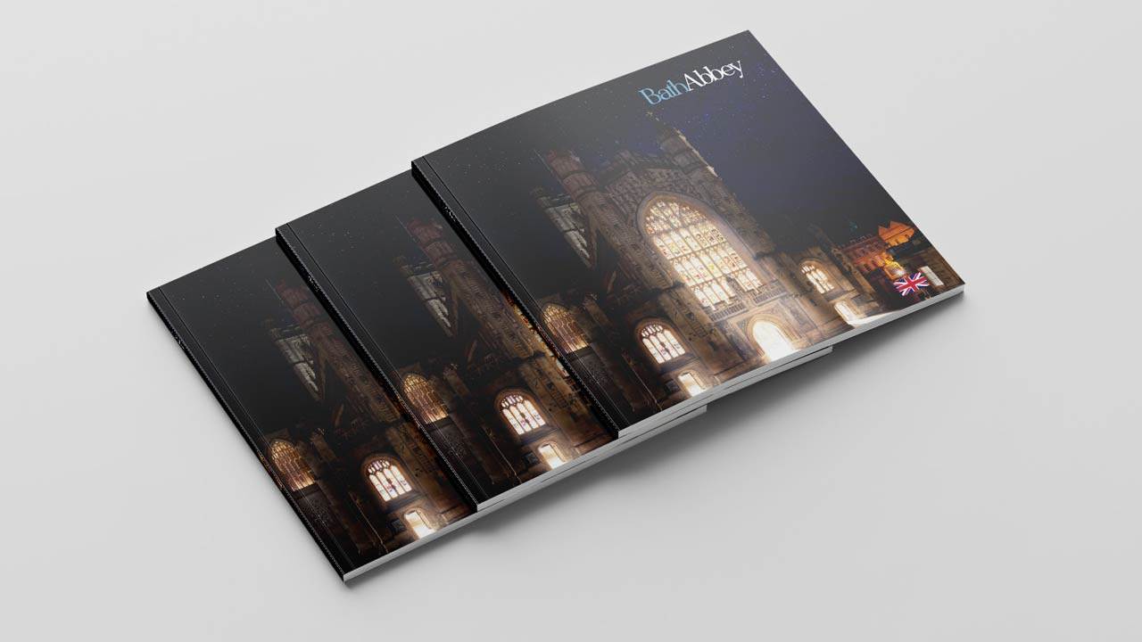 Bath Abbey three displayed guidebooks