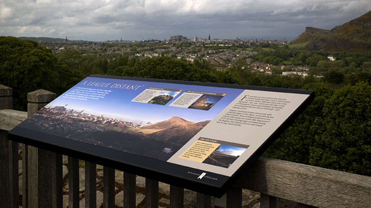 Historic Scotland outdoor information board, Edinburgh in the distance