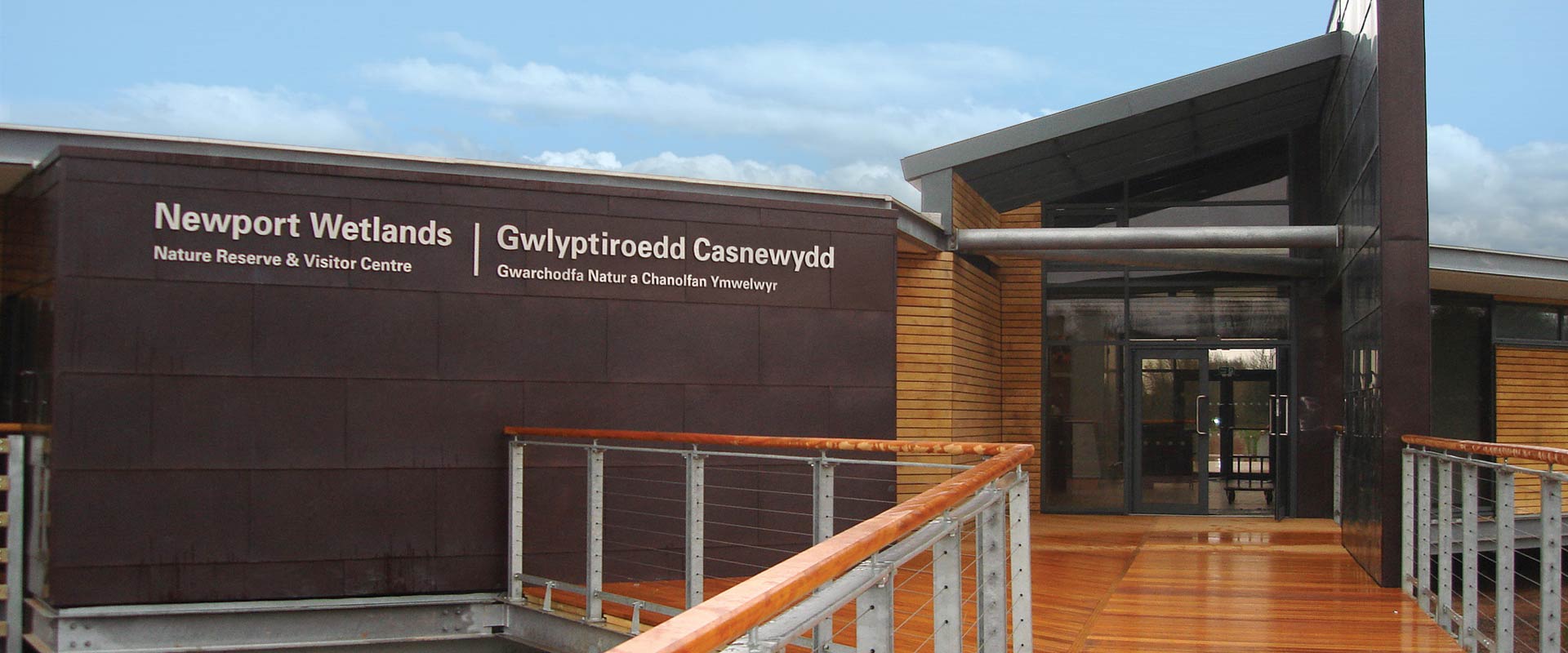 Newport Wetlands visitor centre English and Welsh entrace signage
