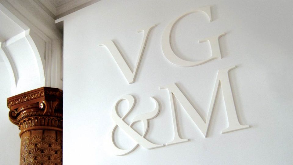 VG&M logo signage in place on wall